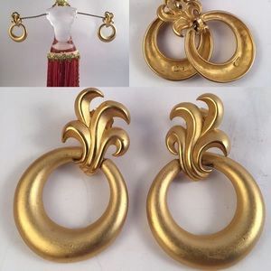 TAT gold tone earrings